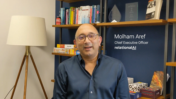 Video still of Molham Aref, CEO of Relational AI, smiling at the camera
